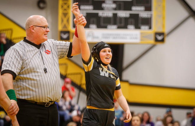 Waverly-Shell Rock sophomore Avery Meier celebrates after winning a state wrestling title at 138 pounds over Missouri Valley's Maddison Buffum on Saturday, Jan. 19, 2019, during the first Iowa girls state wrestling tournament at Waverly-Shell Rock High School in Waverly.