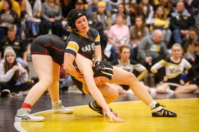 Waverly-Shell Rock sophomore Avery Meier controls Missouri Valley's Maddison Buffum on Saturday, Jan. 19, 2019, during the first Iowa girls state wrestling tournament at Waverly-Shell Rock High School in Waverly.