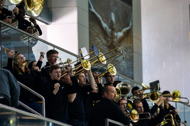 Members of the Iowa pep band perform during a NCAA Big Ten Conference swimming meet on Saturday, Jan. 19, 2019, at the Campus Recreation and Wellness Center in Iowa City, Iowa.