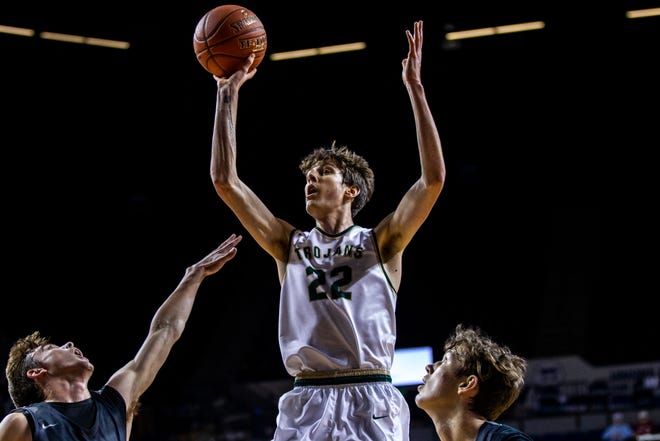 Iowa City West's Patrick McCaffery (22) attempts a basket during a boys' basketball game in the Wells Fargo Advisors Shootout on Saturday, Jan. 19, 2019, at the U.S. Cellular Center in Cedar Rapids, Iowa.