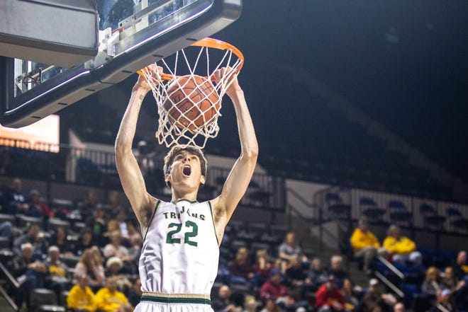 Iowa City West's Patrick McCaffery (22) dunks during a boys' basketball game in the Wells Fargo Advisors Shootout on Saturday, Jan. 19, 2019, at the U.S. Cellular Center in Cedar Rapids, Iowa.