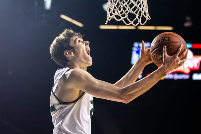 Iowa City West's Patrick McCaffery (22) makes a reverse layup during a boys' basketball game in the Wells Fargo Advisors Shootout on Saturday, Jan. 19, 2019, at the U.S. Cellular Center in Cedar Rapids, Iowa.