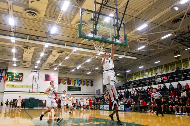 Iowa City West's Patrick McCaffery (22) makes a layup during a Class 4A boys' basketball game on Thursday, Jan. 31, 2019, at West High School in Iowa City, Iowa.