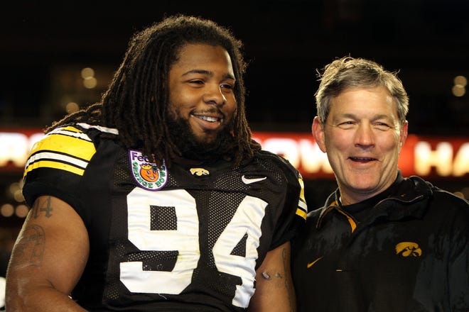 Former Iowa defensive end Adrian Clayborn and current Hawkeyes coach Kirk Ferentz, pictured at the 2010 Orange Bowl, shared another happy moment following the New England Patriots' victory in Super Bowl LIII on Sunday.