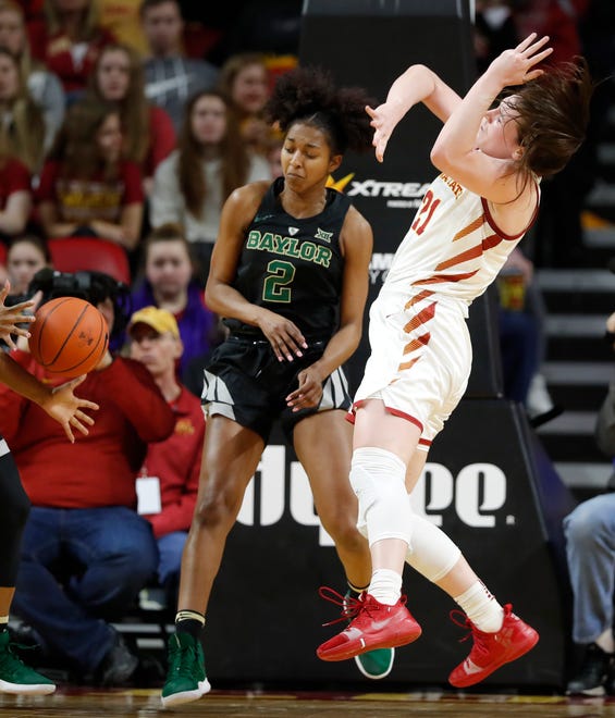 Iowa State guard Bridget Carleton, right, loses the ball in front of Baylor guard DiDi Richards (2) during the second half of an NCAA college basketball game Saturday in Ames.