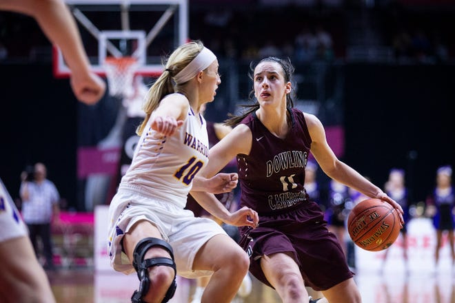 Dowling's Caitlin Clark brings the ball down the court during the Class 5A Iowa girls' state basketball tournament quarterfinal between Dowling Catholic and Waukee on Monday, Feb. 25, 2019, in Wells Fargo Arena.