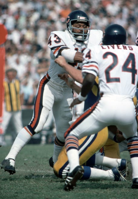 Chicago Bears defensive players Craig Clemons (43) and Virgil Livers (24) in action against the Los Angeles Rams at Los Angeles Memorial Coliseum in 1976.  Clemons, a former Iowa Hawkeye, was the 12th pick of the first round of the 1972 NFL Draft by the Chicago Bears.