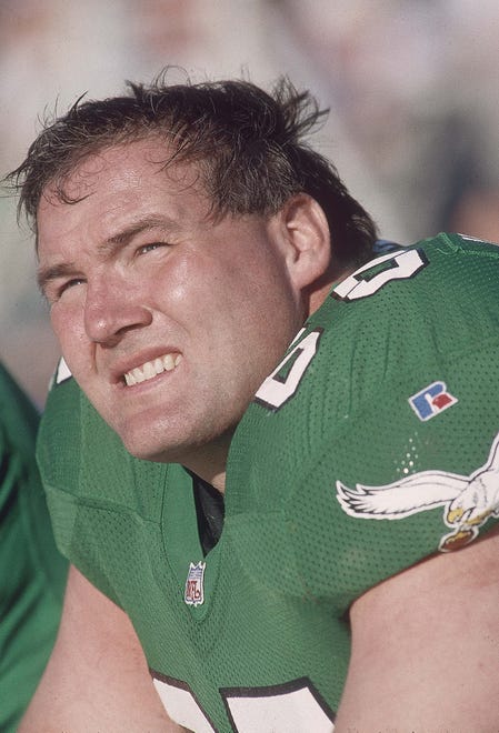 Philadelphia Eagles guard Ron Hallstrom (65) on the bench in 1993 against the Phoenix Cardinals at Sun Devil Stadium. Hallstrom, a former Iowa Hawkeyes, was taken with the 22nd pick by the Green Bay Packers in the first round of the 1982 NFL Draft.