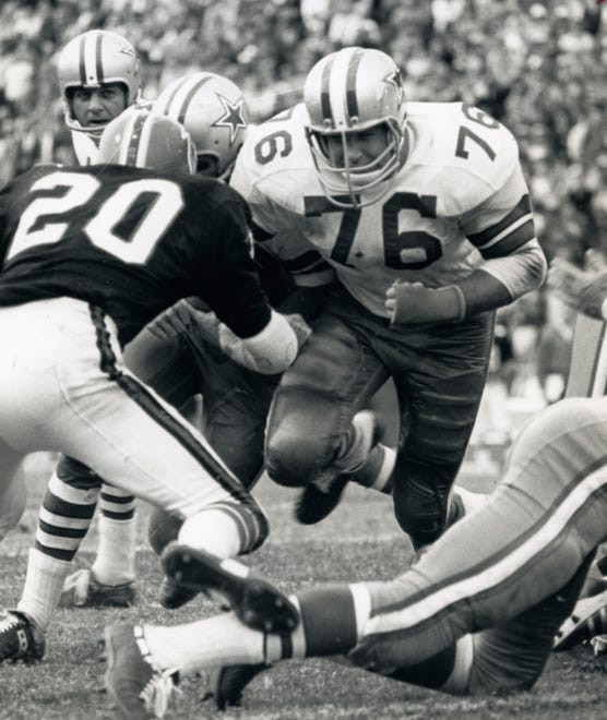 Dallas Cowboys guard John Niland (76) in action during a 1967 game against the Atlanta Falcons. Niland, a former Iowa Hawkeye, was taken fifth overall by the Cowboys in the 1966 NFL Draft.