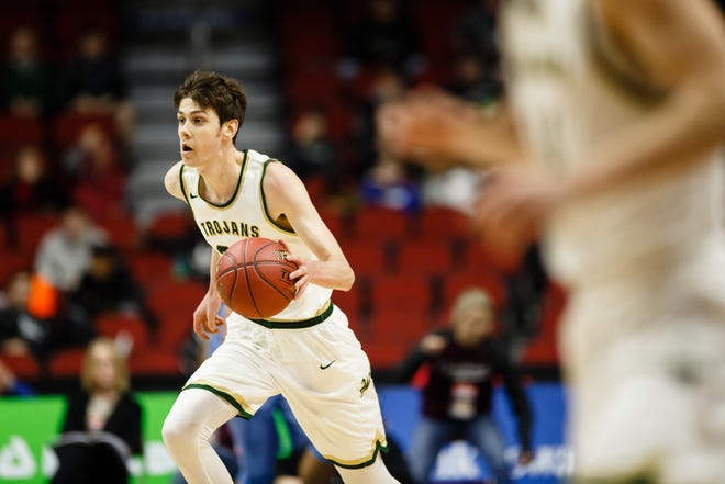 Iowa City West's Patrick McCaffery (22) dribbles up court during their boys 4A state basketball tournament game on Wednesday, March 6, 2019 in Des Moines. Dubuque, Senior would go on to defeat Iowa City, West 39-36.