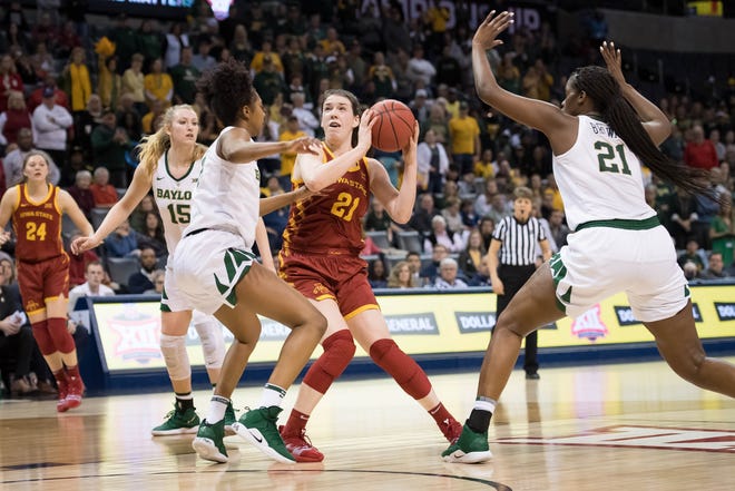 Iowa State Cyclones guard Bridget Carleton (21) pulls up to shoot while defended by Baylor Lady Bears guard DiDi Richards (2) during the fourth quarter in the women's Big 12 Conference Tournament at Chesapeake Energy Arena. Baylor won 67-49.