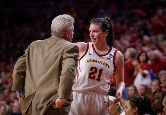 Iowa State senior Bridget Carleton is welcomed to the bench by head coach Bill Fennelly in the fourth quarter against New Mexico State on Saturday, March 23, 2019, at Hilton Coliseum in Ames.