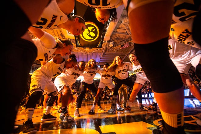Iowa Hawkeyes, including Iowa center Megan Gustafson (10) huddle up following introductions during a NCAA women's basketball tournament second-round game, Sunday, March 24, 2019, at Carver-Hawkeye Arena in Iowa City, Iowa.