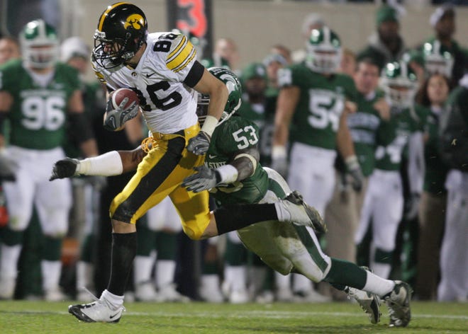Trey Stross (2006-2009) is tackled from behind by Michigan State's Greg Jones on Iowa's final drive in the fourth quarter at Spartan Stadium in East Lansing, Mich., on Oct. 24, 2009.