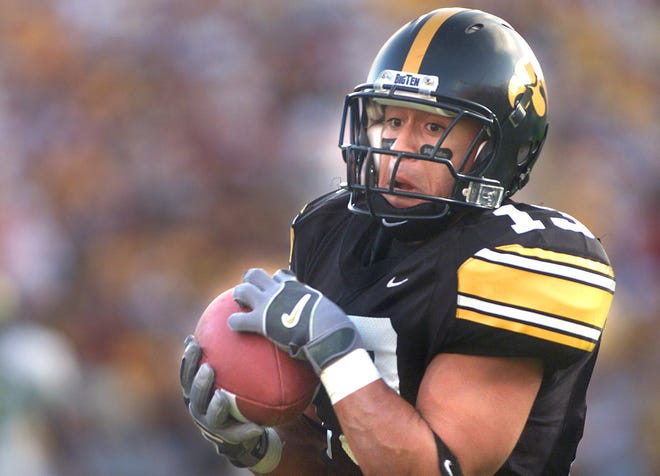Ramon Ochoa (2000, 2002-2003) was not only a speedy receiver, but also a prolific kick returner for the Hawkeyes. Ochoa is pictured scoring a touchdown in the fourth quarter against Michigan on Oct. 4, 2003. Iowa won the game 30-27.