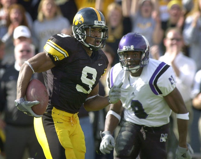 Maurice Brown (2001-2003) scores a touchdown in the second quarter of a game at Kinnick Stadium against Northwestern on Nov. 9, 2002.
