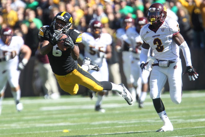 Keenan Davis (2009-2012) pulls in a catch Saturday during Iowa's game against Central Michigan on Sept. 22, 2012.