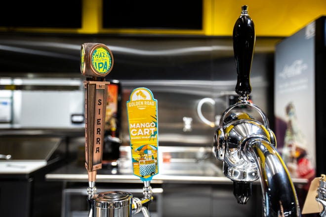 Taps for Hazy Little Thing - Sierra Nevada Brewing Company and Mango Cart - Golden Road Brewing are pictured during a behind the scenes tour, Friday, Aug. 23, 2019, at Kinnick Stadium in Iowa City, Iowa.