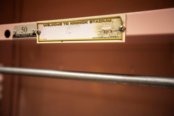 A tag welcomes visiting players to the stadium inside the pink guest locker room is pictured during a behind the scenes tour, Friday, Aug. 23, 2019, at Kinnick Stadium in Iowa City, Iowa.