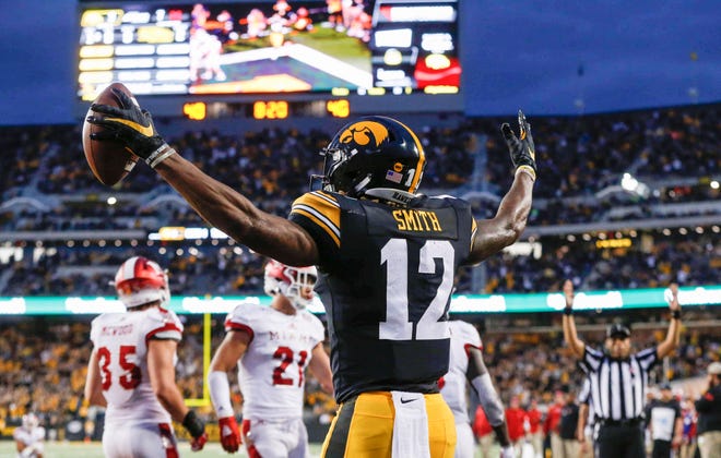 Iowa junior wide receiver Brandon Smith celebrates after pulling down a touchdown pass against Miami of Ohio in the second quarter at Kinnick Stadium in Iowa City on Saturday, Aug. 31, 2019.