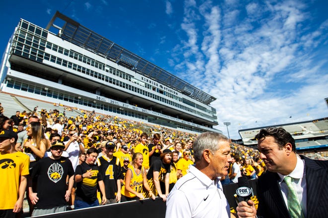 Iowa head coach Kirk Ferentz does an interview before a NCAA Big Ten Conference football game against Rutgers, Saturday, Sept. 7, 2019, at Kinnick Stadium in Iowa City, Iowa.