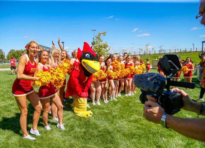 Cy and the ISU cheerleaders work the camera as ESPN College GameDay films outside of Jack Trice Stadium in Ames Friday, Sept. 13, 2019.