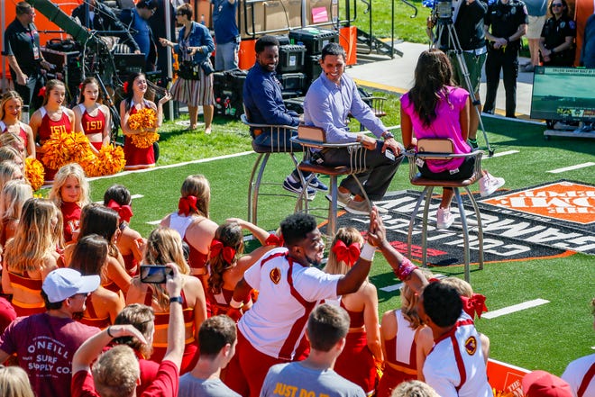 David Pollack, and Desmond Howard chat with ISU cheerleaders before ESPN College GameDay outside of Jack Trice Stadium in Ames Friday, Sept. 13, 2019.
