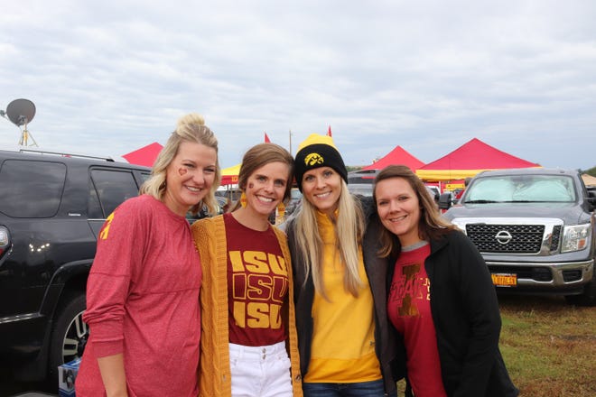 Nikki Sellner (from left) Brittany Widerin, Katie Wiederien and Staci Mease before the Iowa State University game against the University of Iowa on Sept. 14.