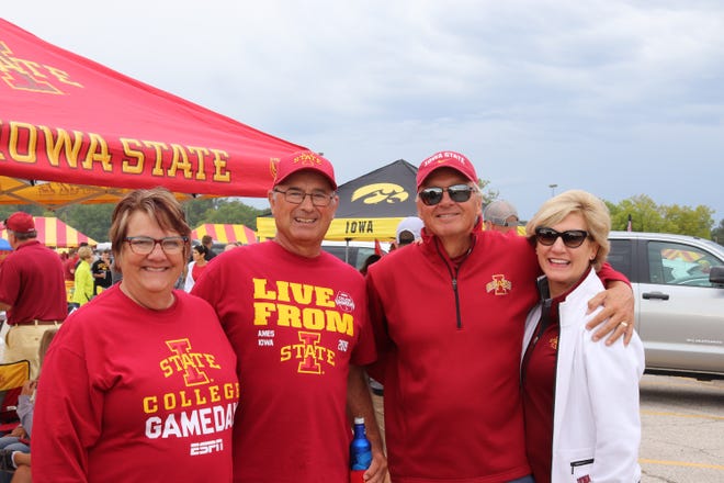 Jill Bergstron (from left) Roger Bergstron, Craig Hanson and Judy Hanson before the Iowa State University game against the University of Iowa on Sept. 14.
Photo by Grant Tetmeyer