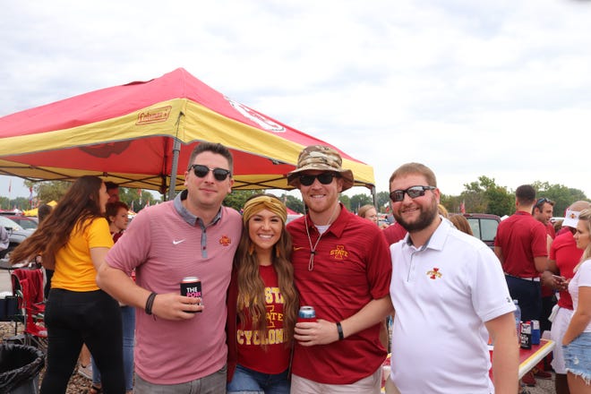 Chris Durand (from left) Chelsey Orlando, Eric Johnson, and Collin Eischeid before the Iowa State University game against the University of Iowa on Sept. 14.
Photo by Grant Tetmeyer