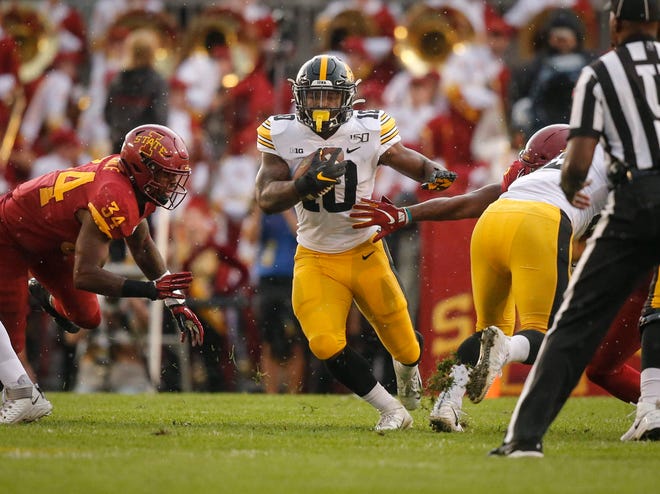 Iowa junior running back Mekhi Sargent runs the ball in the first quarter against Iowa State on Saturday, Sept. 14, 2019, at Jack Trice Stadium in Ames.
