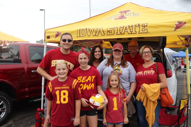 Andrew Peterson (from left) Joshua Peterson, Reilly Peterson, Michelle Peterson, Sara Hill, Mackenzie Peterson, Chuck Peterson and Sidney Peterson before the Iowa State University game against the University of Iowa on Sept. 14.