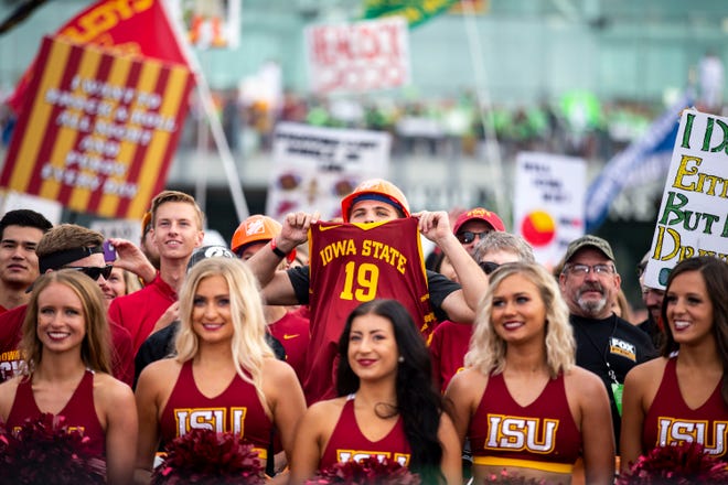 An Iowa State fan holds up his jersey on the set of ESPN's "College GameDay" before the Iowa vs. Iowa State football game on Saturday, Sep. 14, 2019, in Ames, Iowa.