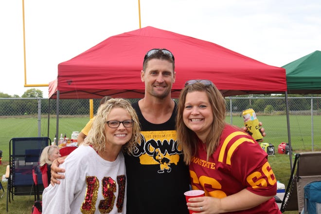 Kari Chaplin (from left) Brock Chaplin and Steph McWilliams before the Iowa State University game against the University of Iowa on Sept. 14.
Photo by Grant Tetmeyer