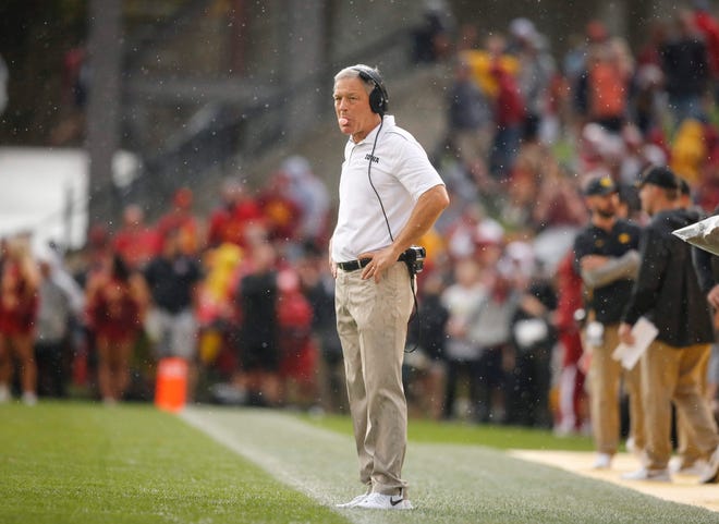 Iowa head football coach Kirk Ferentz observes action on the sideline as rain falls around him in the first quarter against Iowa State on Saturday, Sept. 14, 2019, at Jack Trice Stadium in Ames.