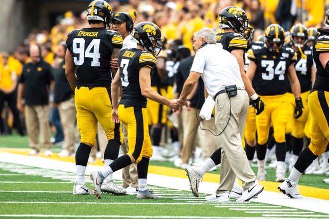 Iowa head coach Kirk Ferentz high-fives Iowa placekicker Keith Duncan (3) after a field goal during a NCAA non conference football game between the Iowa Hawkeyes and Middle Tennessee State, Saturday, Sept., 28, 2019, at Kinnick Stadium in Iowa City, Iowa.