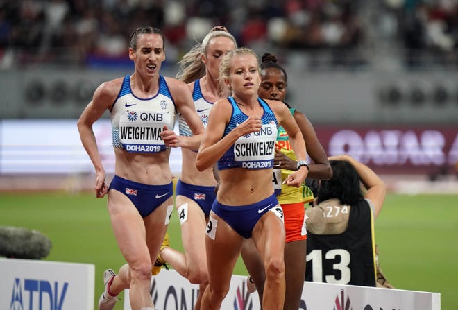Oct. 5: American Karissa Schweizer, front, places ninth in the women's 5,000 meters.