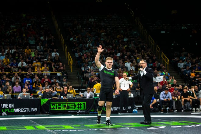 Patrick Kennedy, of Minnesota, waves to fans after a 5-2 victory over Alex Faundo, of Michigan, at 170 pounds during Flowrestling's Who's Number One event, Saturday, Oct., 5, 2019, at Carver-Hawkeye Arena in Iowa City, Iowa.