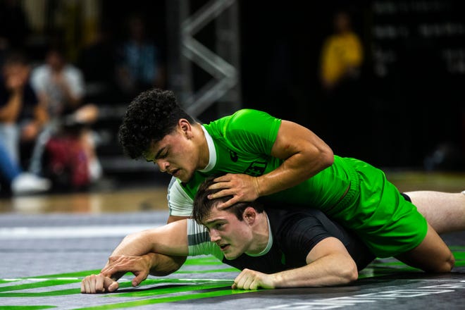 Ryan Sokol, of Minnesota, wrestles Beau Bartlett, of Pennsylvania, (green) during Flowrestling's Who's Number One event, Saturday, Oct., 5, 2019, at Carver-Hawkeye Arena in Iowa City, Iowa.