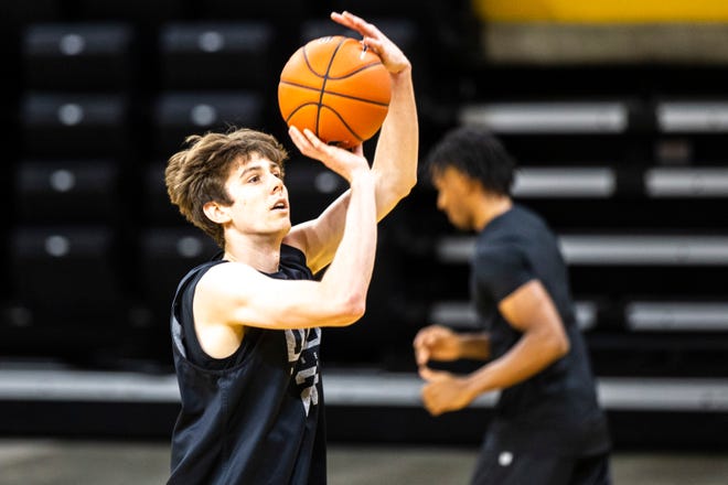 Iowa forward Patrick McCaffery (22) shoots a basket during an open practice following the Hawkeyes men's basketball media day, Wednesday, Oct., 9, 2019, at Carver-Hawkeye Arena in Iowa City, Iowa.
