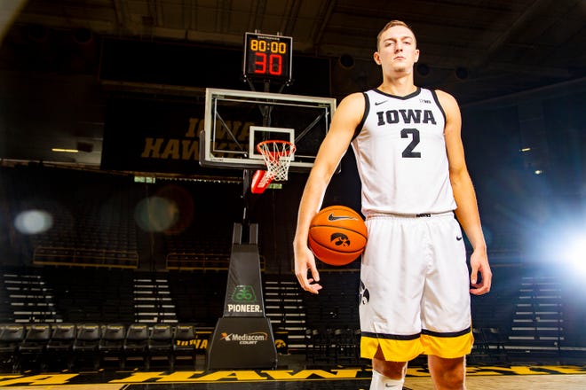 Jack	Nunge stands for a portrait during Iowa basketball during media day in Iowa City Wednesday, Oct. 9, 2019.