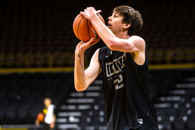 Iowa forward Patrick McCaffery (22) shoots a 3-point basket during an open practice following the Hawkeyes men's basketball media day, Wednesday, Oct., 9, 2019, at Carver-Hawkeye Arena in Iowa City, Iowa.