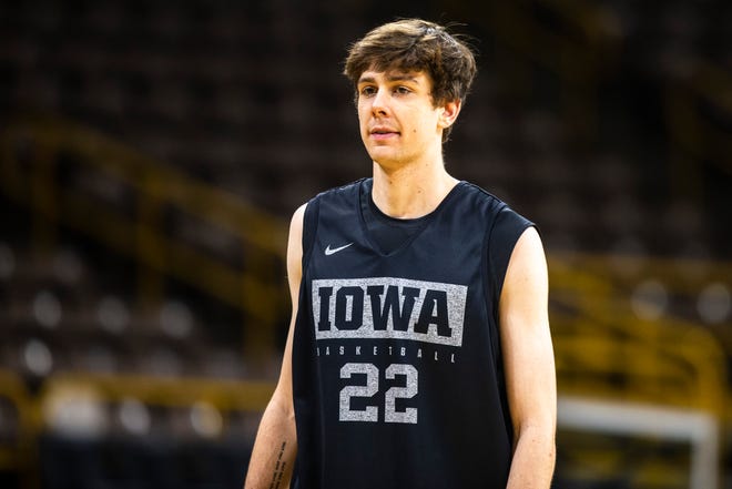 Iowa forward Patrick McCaffery (22) warms up during an open practice following the Hawkeyes men's basketball media day, Wednesday, Oct., 9, 2019, at Carver-Hawkeye Arena in Iowa City, Iowa.