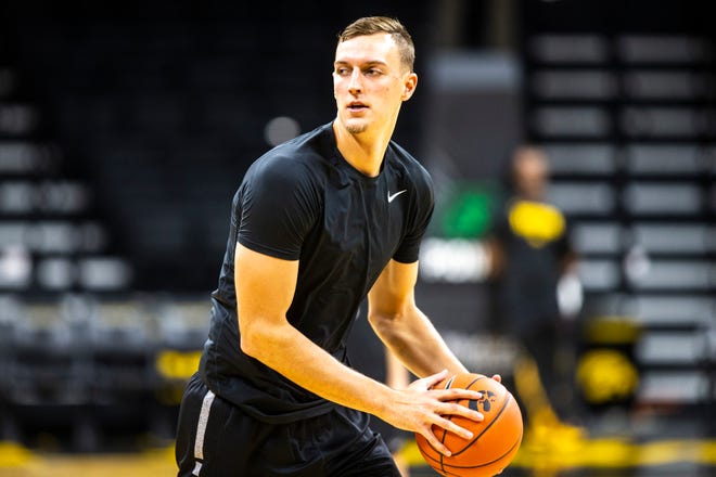 Iowa forward Jack Nunge (2) warms up during an open practice following the Hawkeyes men's basketball media day, Wednesday, Oct., 9, 2019, at Carver-Hawkeye Arena in Iowa City, Iowa.