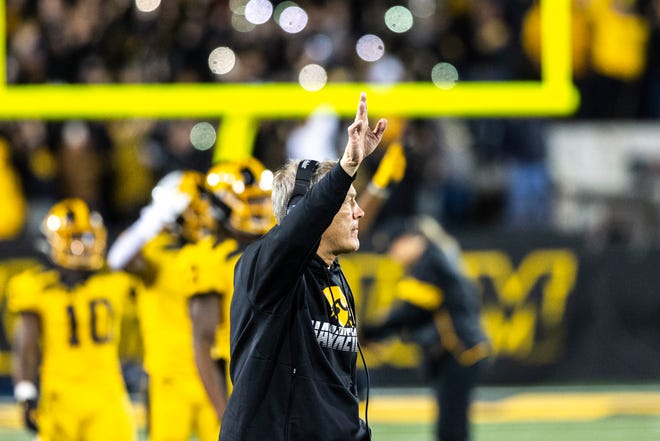 Iowa head coach Kirk Ferentz waves to patients in the Stead Family Children's Hospital after the first quarter during a NCAA Big Ten Conference football game between the Iowa Hawkeyes and Penn State, Saturday, Oct., 12, 2019, at Kinnick Stadium in Iowa City, Iowa.