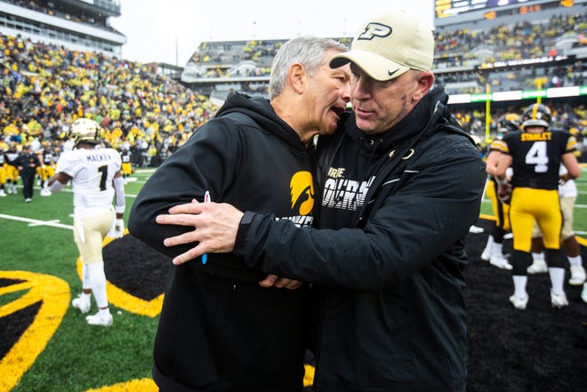 Iowa head coach Kirk Ferentz shakes hands with Purdue head coach Jeff Brohm after a NCAA Big Ten Conference football game between the Iowa Hawkeyes and Purdue, Saturday, Oct., 19, 2019, at Kinnick Stadium in Iowa City, Iowa.