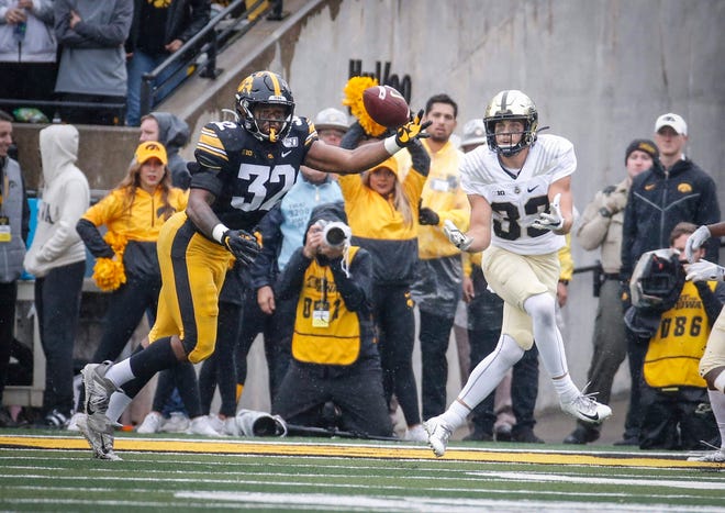 Iowa sophomore linebacker Djimon Colbert breaks up a pass intended for Purdue in the fourth quarter on Saturday, Oct. 19, 2019, at Kinnick Stadium in Iowa City.