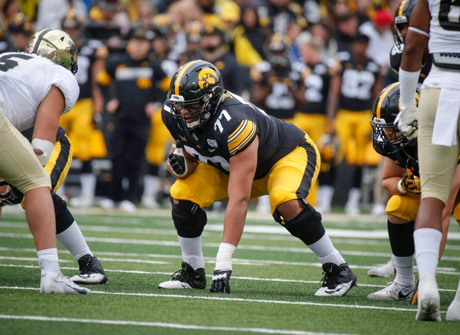 Iowa junior offensive lineman Alaric Jackson waits for the snap in the first quarter against Purdue on Saturday, Oct. 19, 2019, at Kinnick Stadium in Iowa City.