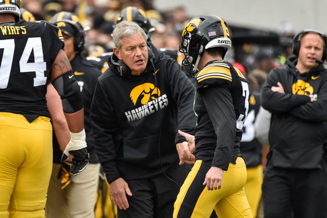 Oct 19, 2019; Iowa City, IA, USA; Iowa Hawkeyes head coach Kirk Ferentz (left) celebrates with placekicker Keith Duncan (3) after a field goal against the Purdue Boilermakers during the first quarter at Kinnick Stadium. Mandatory Credit: Jeffrey Becker-USA TODAY Sports