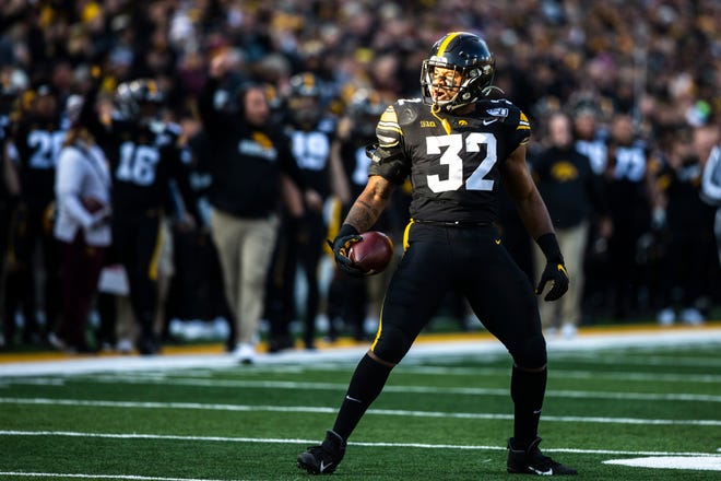 Iowa linebacker Djimon Colbert (32) reacts after coming up with a ball after a play during a NCAA Big Ten Conference football game, Saturday, Nov., 16, 2019, at Kinnick Stadium in Iowa City, Iowa.